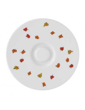 Sur la soucoupe on voit des feuilles morte orange et rouge