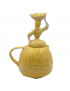 Théière jaune  représentant une varina